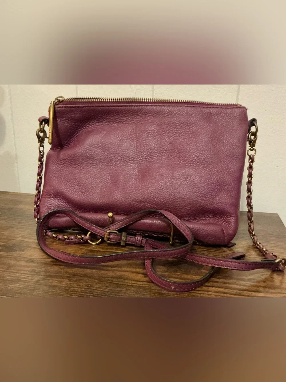 a Vintage Rare Elliott Lucca burgundy Leather laser-cut leather crossbody bag